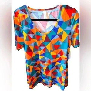 Lularoe small multicolor geometric Perfect T. NWT. Bright and colorful swing top